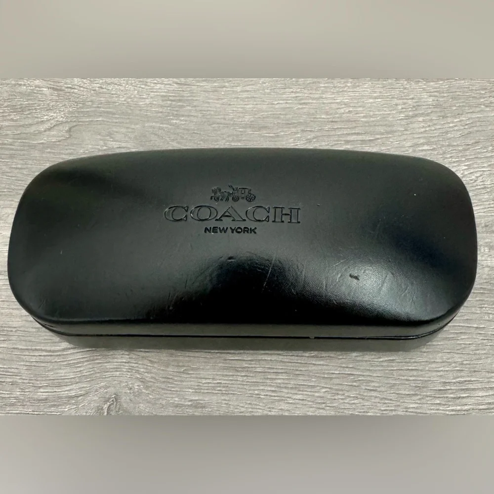 COACH New York Glasses case Black. Used. Has some small dents. See photo.